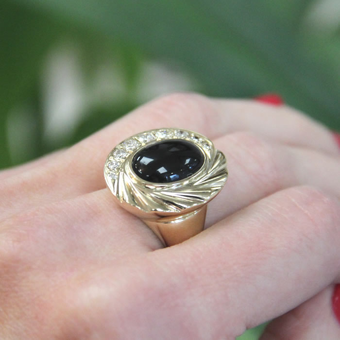 Oval Onyx and Diamond Ring